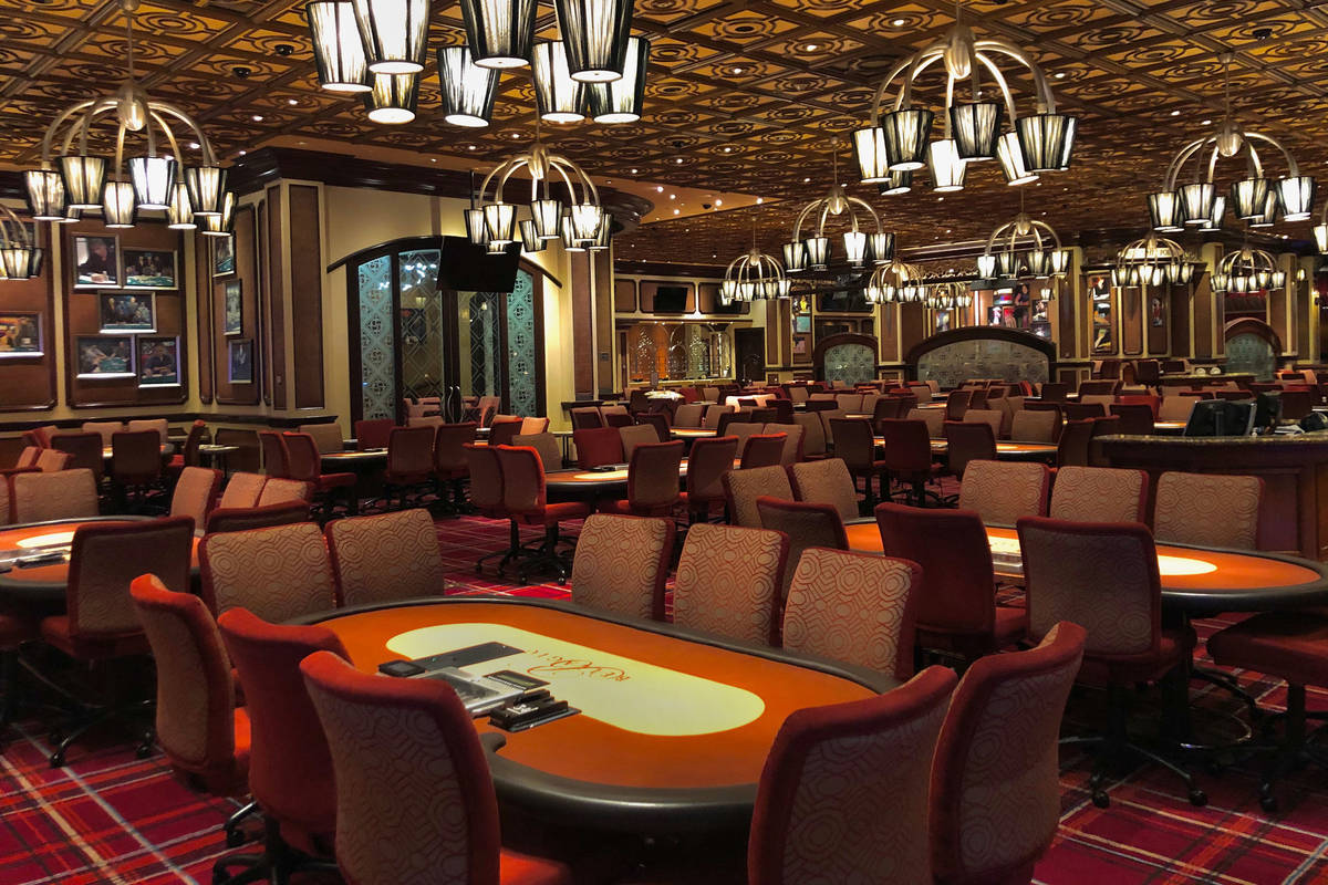 The poker room sits vacant within the Bellagio as MGM shuts down casino operations at midnight ...