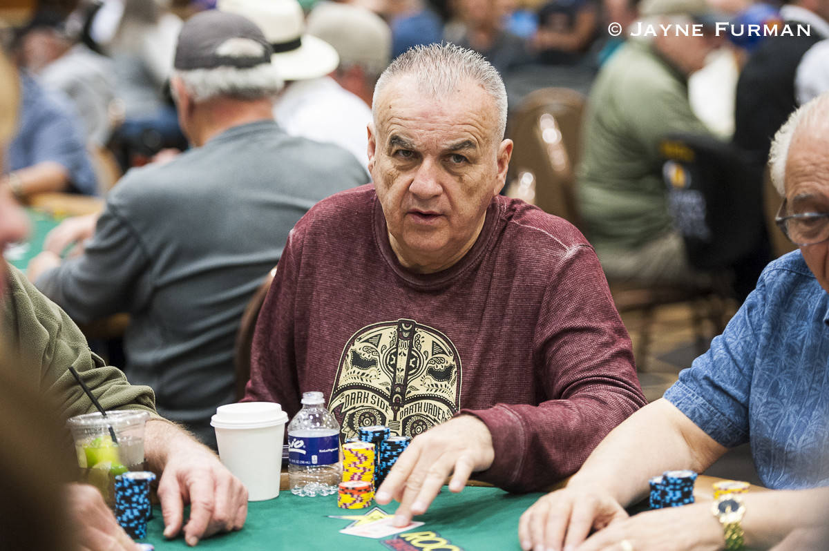 Sam Grizzle plays in the $1,000 buy-in Super Seniors No-limit Hold'em event at the World Series ...